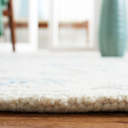 SAFAVIEH Micro-Loop Collection Area Rug - 9' x 12', Ivory & Grey, Handmade Wool, Ideal for High Traffic Areas in Living Room, Bedroom (MLP534F)