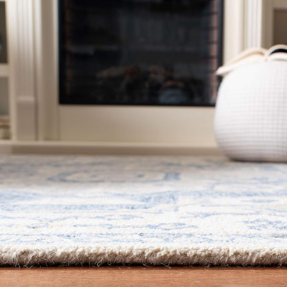 SAFAVIEH Micro-Loop Collection Area Rug - 5' Square, Ivory & Blue, Handmade Shabby Chic Medallion Wool, Ideal for High Traffic Areas in Living Room, Bedroom (MLP503G)