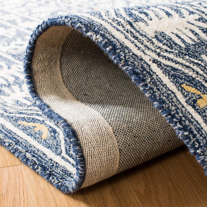 SAFAVIEH Micro-Loop Collection Area Rug - 5' x 8', Blue & Ivory, Handmade Wool, Ideal for High Traffic Areas in Living Room, Bedroom (MLP619M)