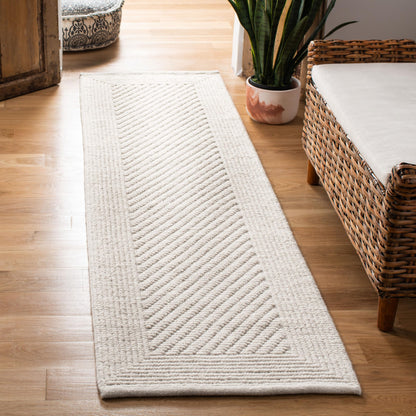 SAFAVIEH Natura Collection Area Rug - 5' x 8', Ivory, Handmade Wool, Ideal for High Traffic Areas in Living Room, Bedroom (NAT450A)