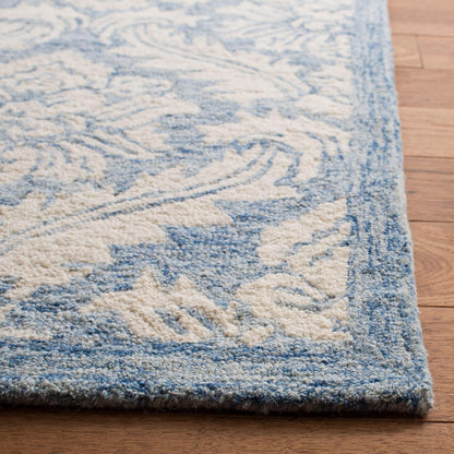 SAFAVIEH Micro-Loop Collection Area Rug - 5' x 8', Blue, Handmade Damask Wool, Ideal for High Traffic Areas in Living Room, Bedroom (MLP513M)