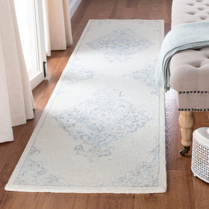 SAFAVIEH Area Rug 8x10 - Micro-Loop Collection - Large - Ivory & Blue, Handmade Wool, Ideal for Living Room, Bedroom, Office, Dining Space (MLP516A)