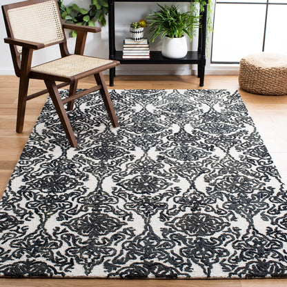 SAFAVIEH Blossom Collection Area Rug - 9' x 12', Beige & Ivory, Handmade Wool, Ideal for High Traffic Areas in Living Room, Bedroom (BLM112B)