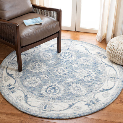 SAFAVIEH Micro-Loop Collection Area Rug - 6' x 9', Light Blue & Ivory, Handmade Wool, Ideal for High Traffic Areas in Living Room, Bedroom (MLP536L)